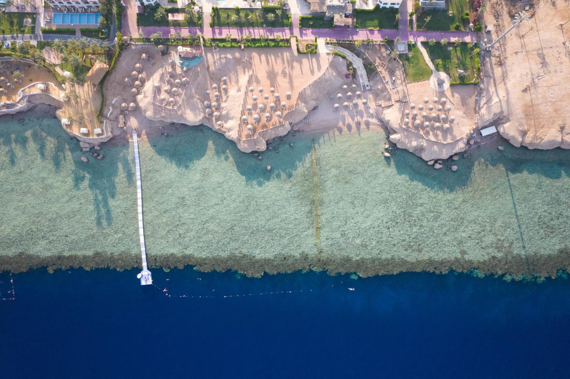 Safir Sharm Waterfalls Resort Εξωτερικό φωτογραφία Aerial view of the beach